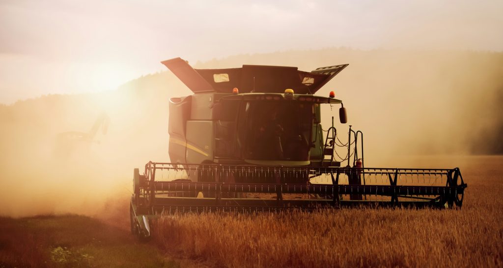 working with tractors in the field